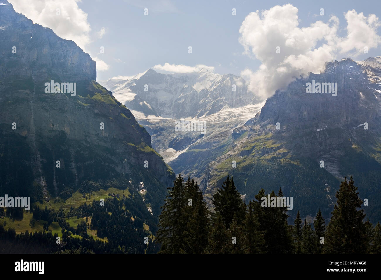 The valley of the Oberer Grindelwaldgletscher taken from the First cablecar across the Lüschental, Bernese Oberland, Switzerland Stock Photo