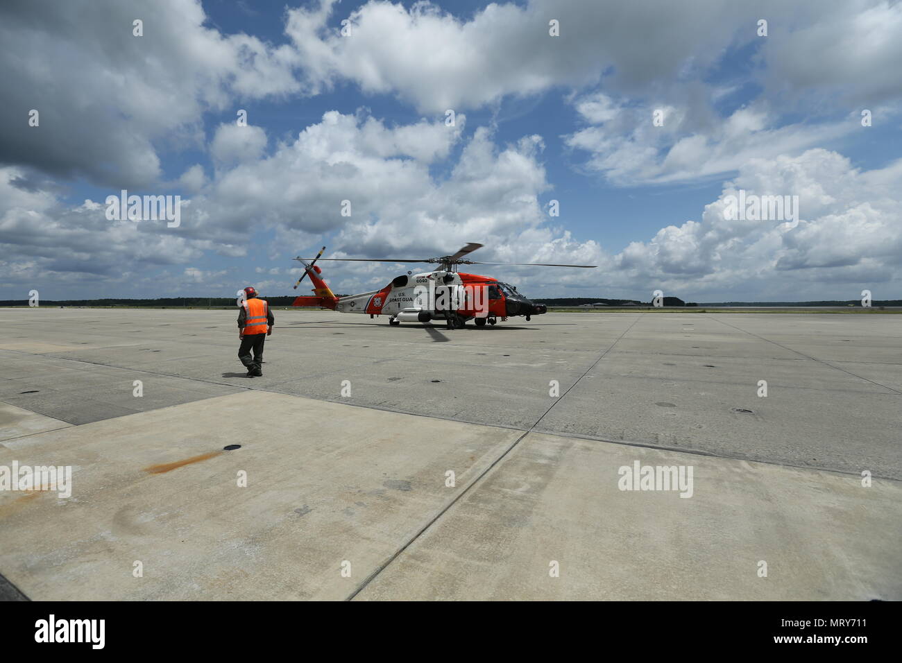 A U.S. Coast Guard MH-60T Jayhawk lands on the flight line at Marine Corps Air Station Cherry Point, N.C. after the Fifth District Search and Rescue Exercise (SAREX) on July 11, 2017. SAREX was a joint exercise conducted to certify the U.S. Coast Guard's capability to rescue Marine Corps pilots in the event of a downed aircraft. (U.S. Marine Corps photo by Lance Cpl. Jailine L. Martinez) Stock Photo