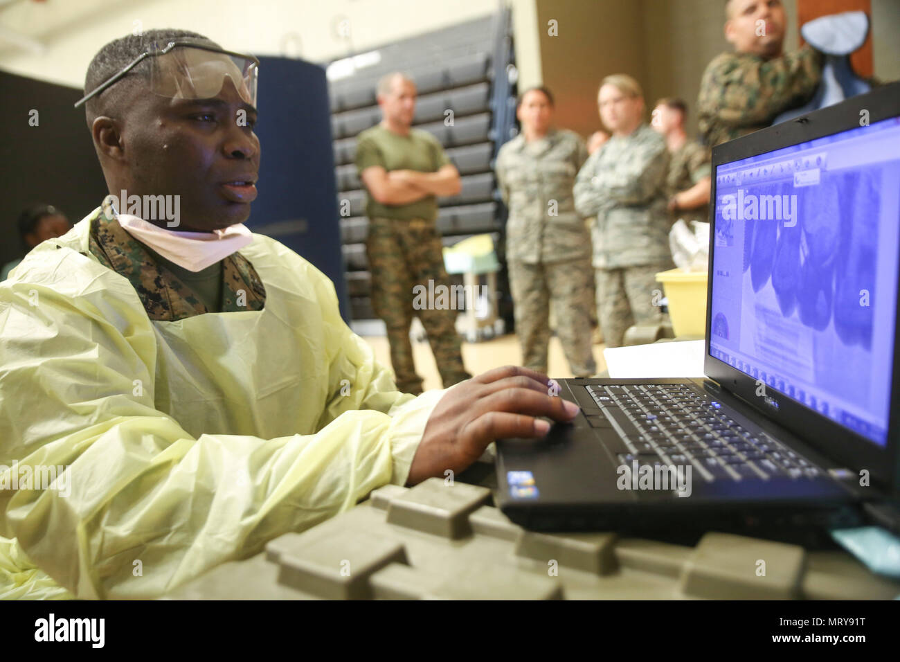 NAPOLEONVILLE, La. Petty Officer 3rd Class Dumbuos Asigri, a dental