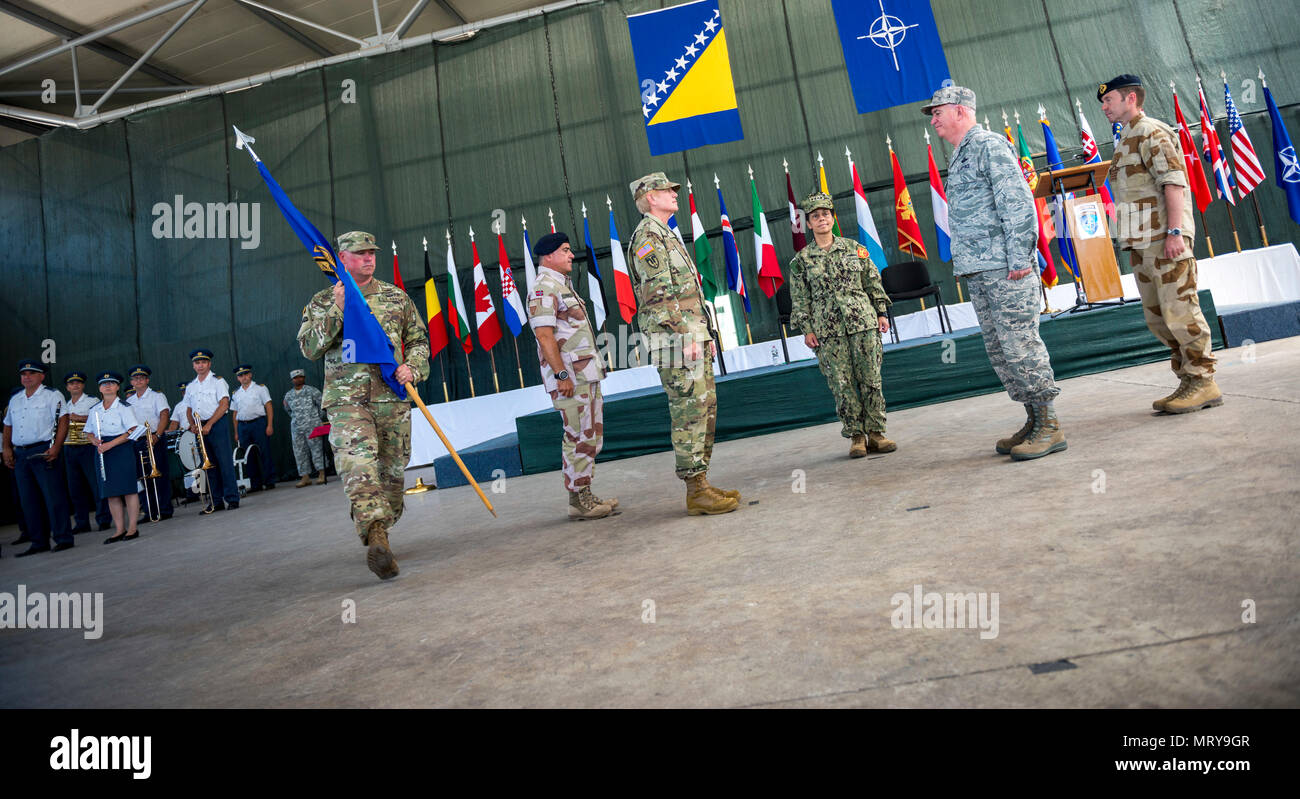 U.S. Army Brig. Gen. Giselle Wilz transfers authority of NATO Headquarters Sarajevo to U.S. Air Force Brig. Gen. Robert Huston during a ceremony held on June 27th, 2017 at Camp Butmir, Bosnia and Herzegovina. (U.S. Air Force photo by Tech. Sgt. Jeremy Bowcock) Stock Photo