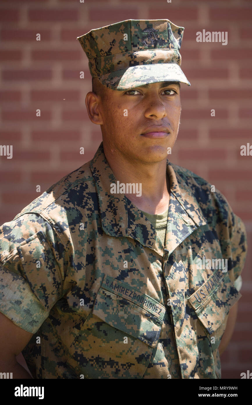 Pvt. Daniel Ramirez Rodriguez, Platoon 2050, Hotel Company, 2nd Recruit Training Battalion, earned U.S. citizenship July 13, 2017, on Parris Island, S.C. Before earning citizenship, applicants must demonstrate knowledge of the English language and American government, show good moral character and take the Oath of Allegiance to the U.S. Constitution. Ramirez Rodriguez, from Cullman, Ala., originally from Mexico, is scheduled to graduate July 14, 2017. (Photo by Lance Cpl. Maximiliano Bavastro) Stock Photo