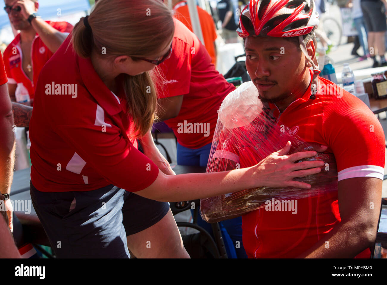 U.S. Marine Corps veteran Guillermo Lopez receives ice for his shoulder after the 2017 DoD Warrior Games Cycling Competition in Chicago July 6, 2017. Lopez, a native of San Antonio, Texas, is a member of Team Marine Corps. The DoD Warrior Games is an adaptive sports competition for wounded, ill and injured service members and veterans. (U.S. Marine Corps photo by Lance Cpl. Nadia J. Stark) Stock Photo