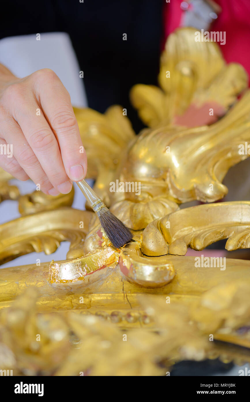 Renovation of gilt frame Stock Photo Alamy