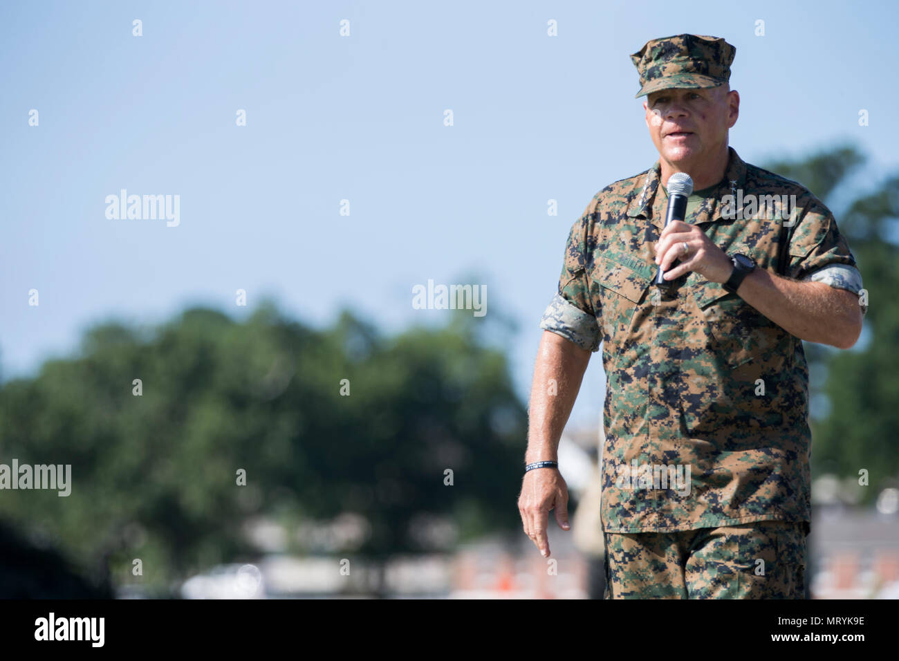 U.S. Marine Corps Gen. Robert B. Neller, commandant of the Marine Corps, speaks to the audience during the II Marine Expeditionary Force (II MEF) change of command ceremony on Camp Lejeune, N.C., July 14, 2017.During the ceremony, Maj. Gen. Walter L. Miller Jr. relinquished his command as commanding general of II MEF to Lt. Gen. Robert F. Hedelund. (U.S. Marine Corps photo by Lance Cpl. Koby I. Saunders) Stock Photo