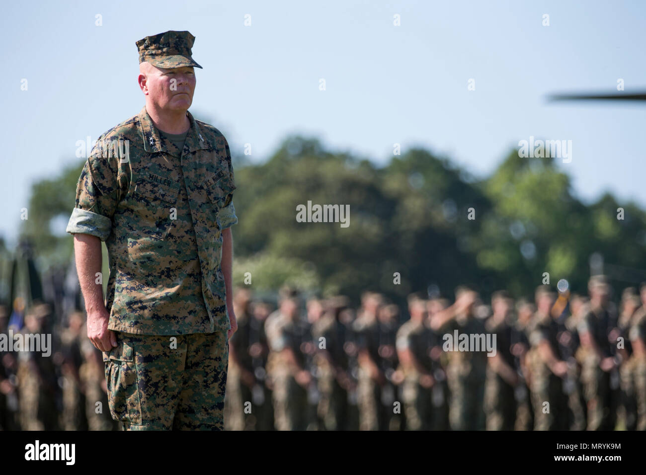 U.S. Marine Corps Maj. Gen. Walter L. Miller Jr., former commanding general of the II Marine Expeditionary Force (MEF), stands at attention during a change of command ceremony on Camp Lejeune, N.C., July 14, 2017. During the ceremony, Miller relinquished his command as commanding general of II MEF to Lt. Gen. Robert F. Hedelund. (U.S. Marine Corps photo by Lance Cpl. Koby I. Saunders) Stock Photo