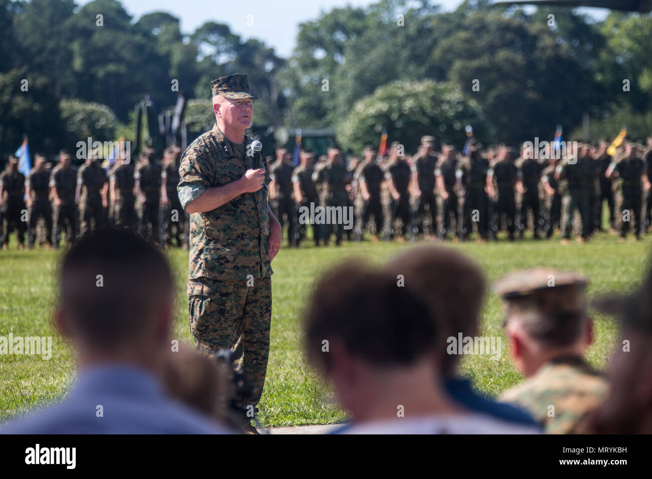 U.S. Marine Corps Maj Gen. Walter L. Miller, Jr., speaks to the audience during the II Marine Expeditionary Force (II MEF) change of command ceremony on Camp Lejeune, N.C., July 14, 2017. During the ceremony, Miller relinquished his post as commanding general of II MEF to Lt. Gen. Robert F. Hedelund. (U.S. Marine Corps photo by Lance Cpl. Zachary M. Ford) Stock Photo
