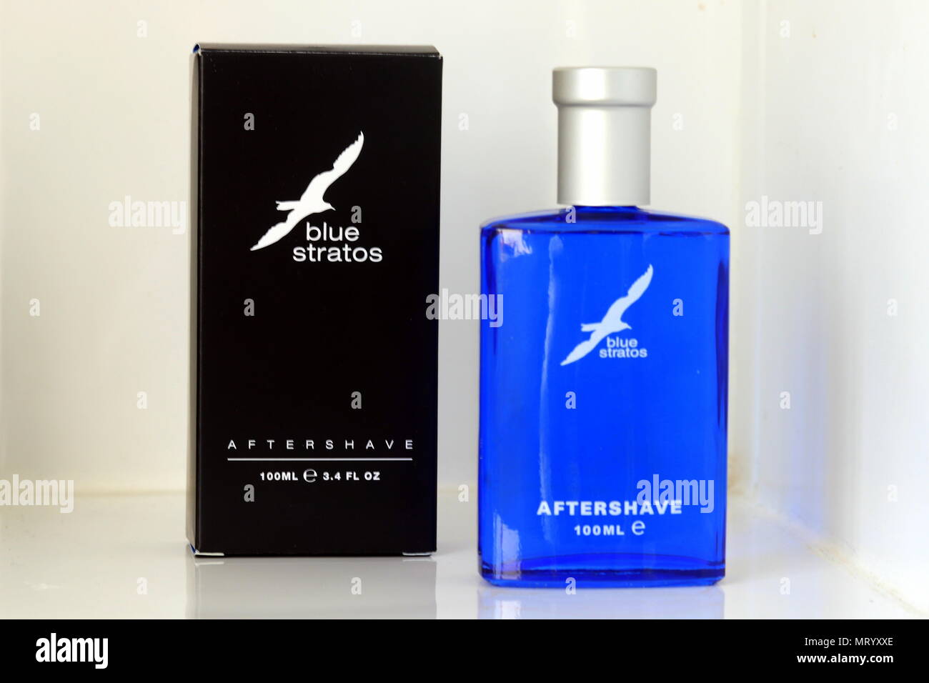 Blue Stratos aftershave bottle and box Stock Photo