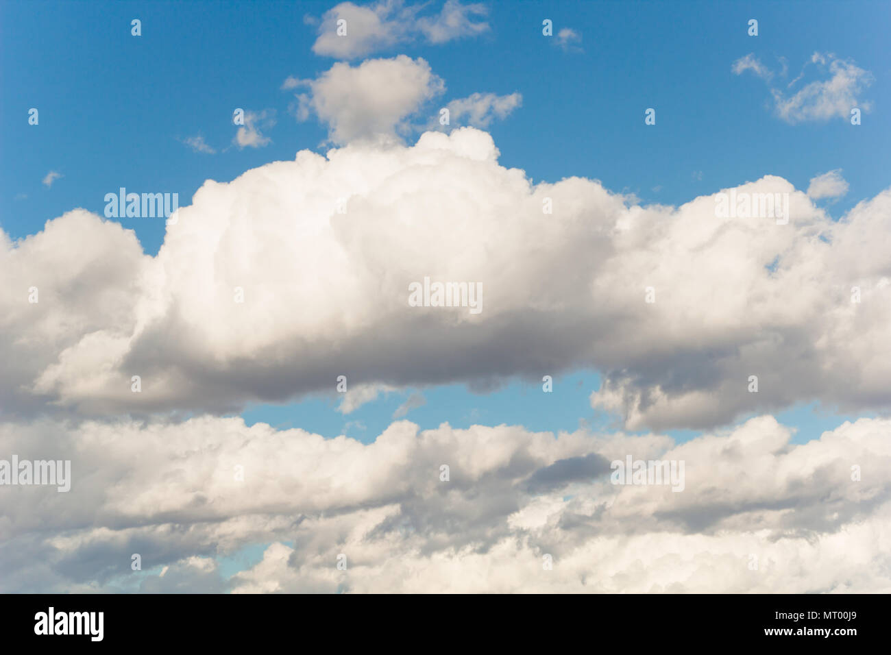 fluffy white clouds in a blue sky in sunny summer day natural backdrop ...