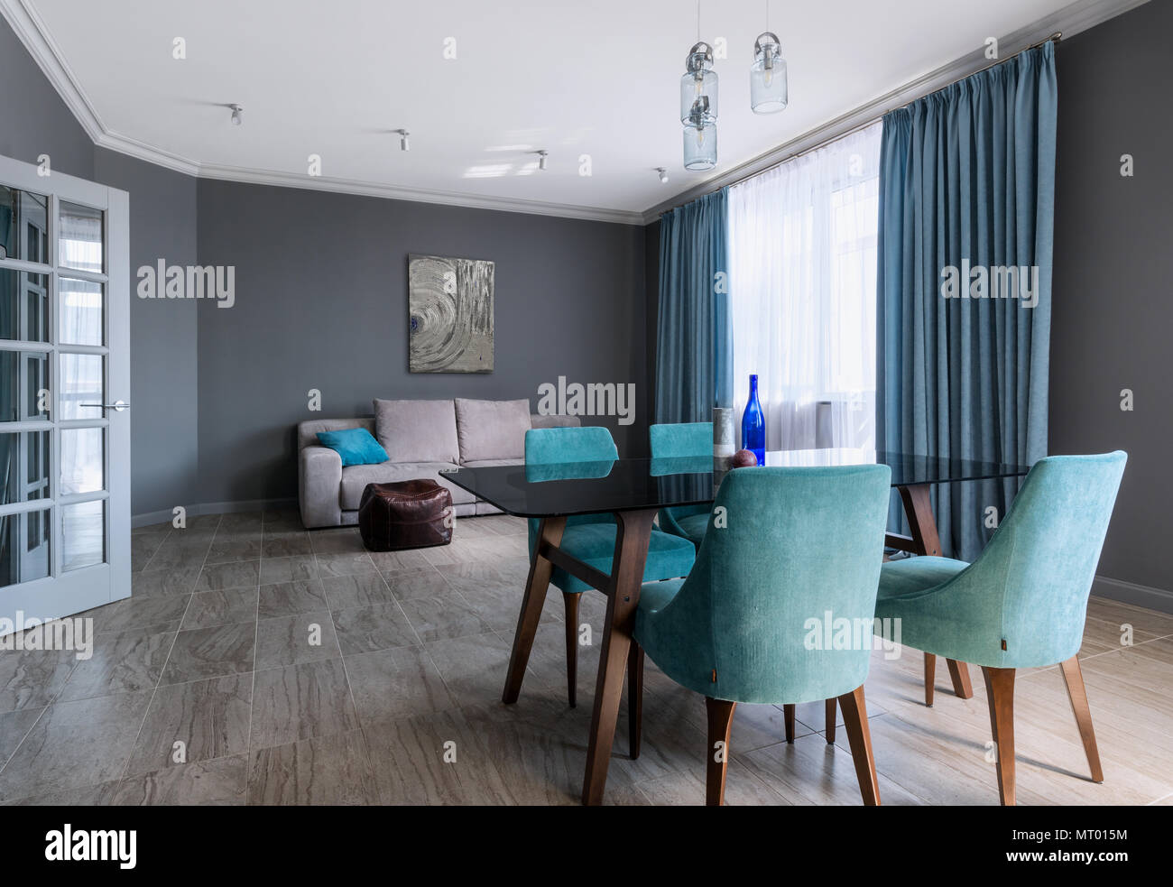 Spacious classic living room in gray and blue tones Stock Photo