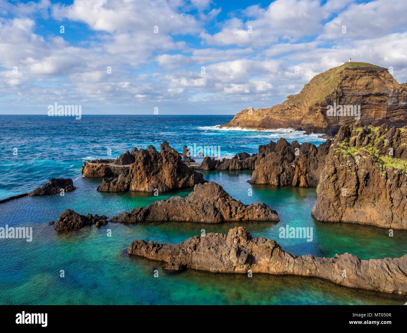Natural swimming pools on volcanic region of Porto Moniz, Madeira island,  Portugal Stock Photo - Alamy