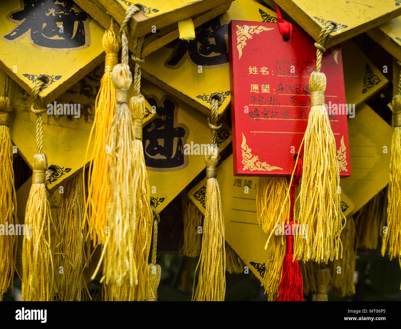 Hanging prayers in a chinese temple Stock Photo - Alamy