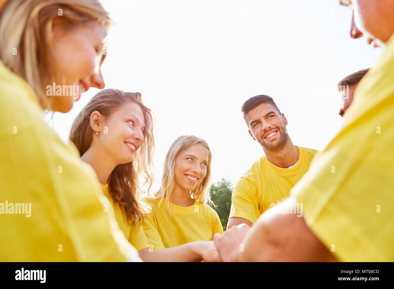 Group develops the team spirit during an exercise at a teambuilding event Stock Photo