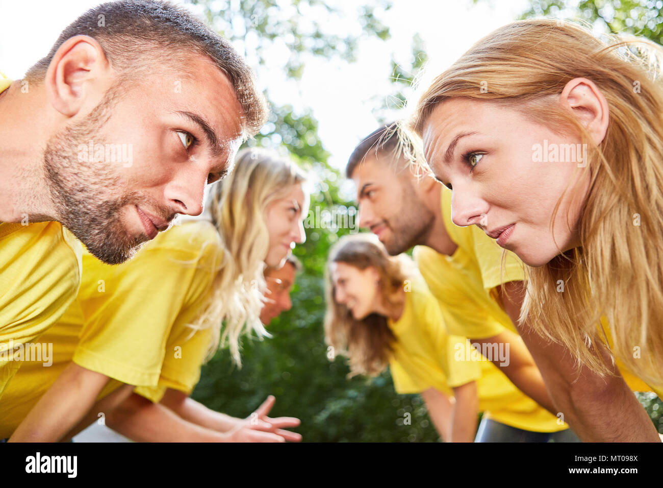 Woman and man doing a team building exercise in team building