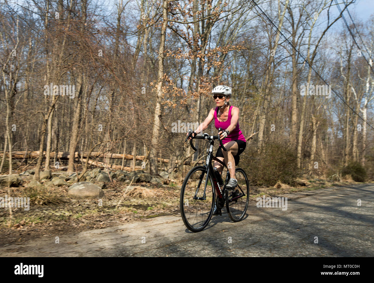old woman riding bike