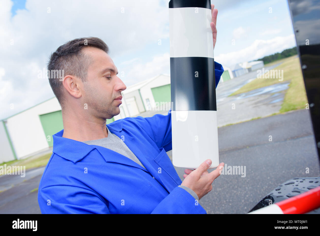 man with bollard Stock Photo Alamy