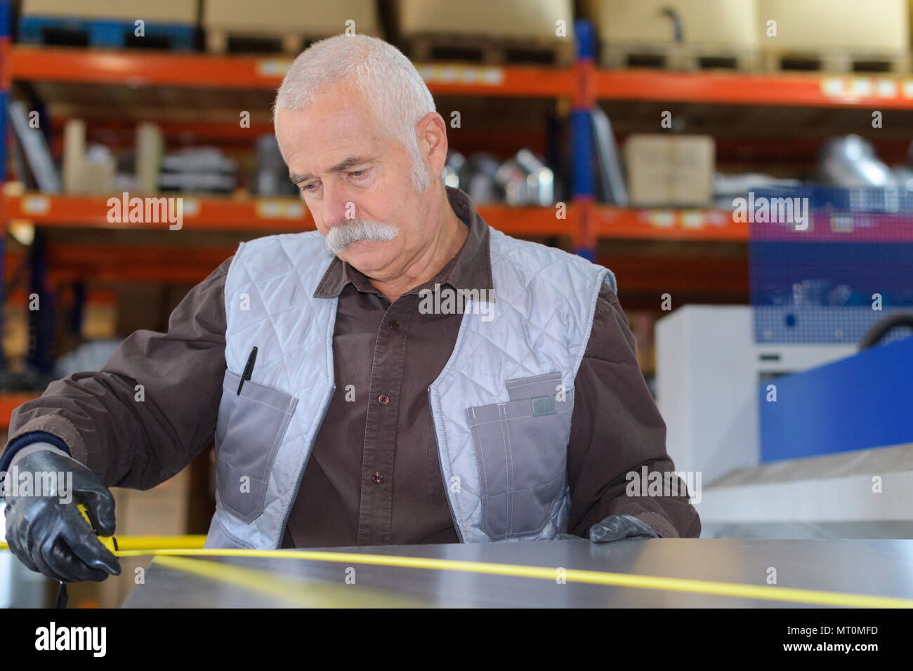 sebiiro operator works at machine Stock Photo