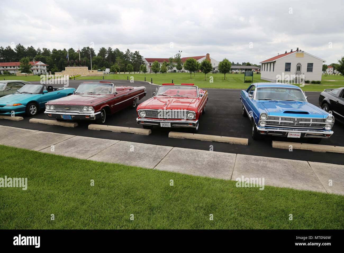 Classic cars line the Fort McCoy Commemorative Area parking lot July 12