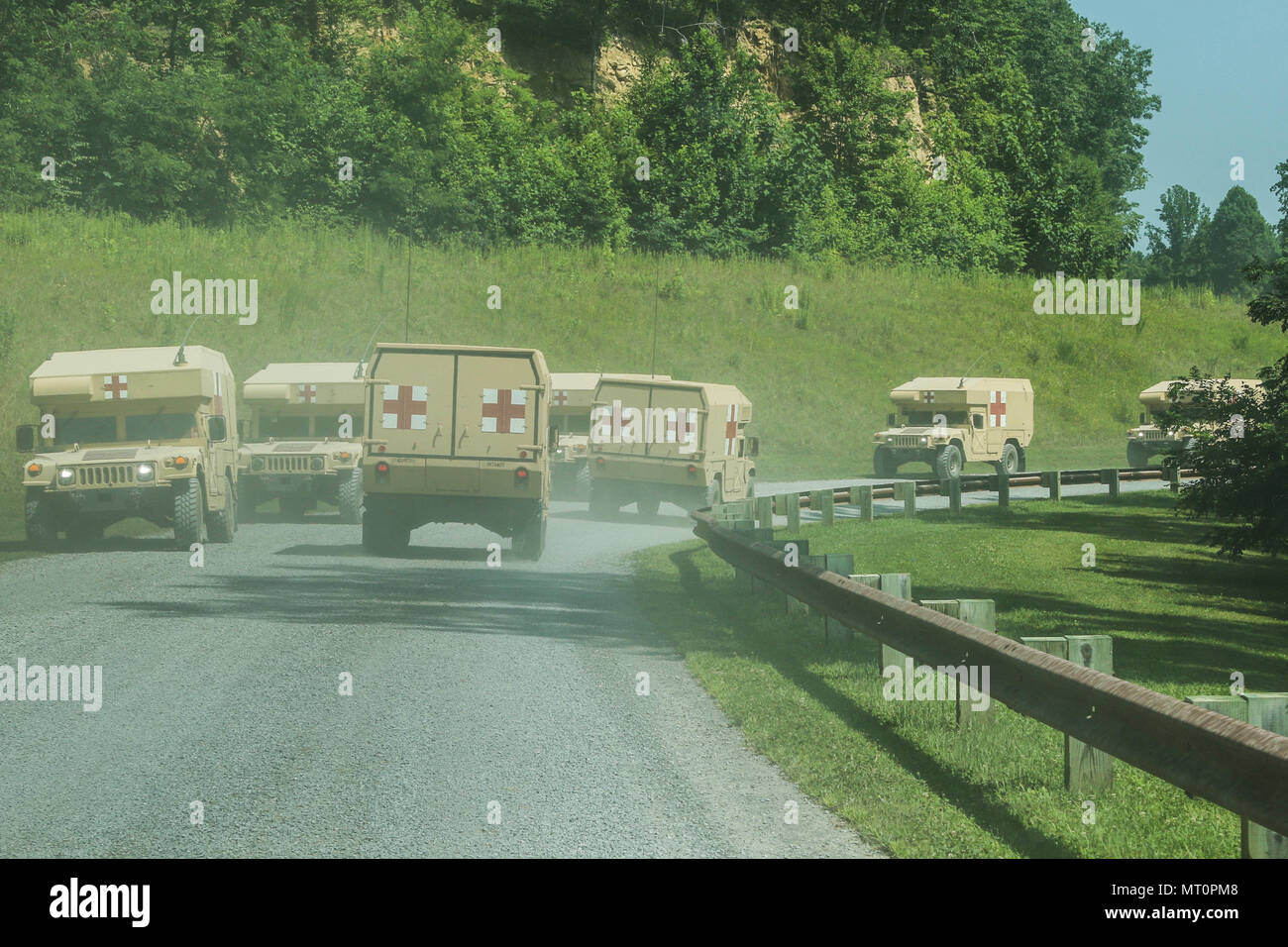 Army field litter ambulances conduct route reconnaissance convoys July