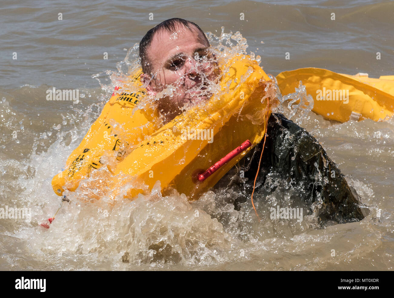 Aircrew members from Travis Air Force Base, Calif., master basic water ...