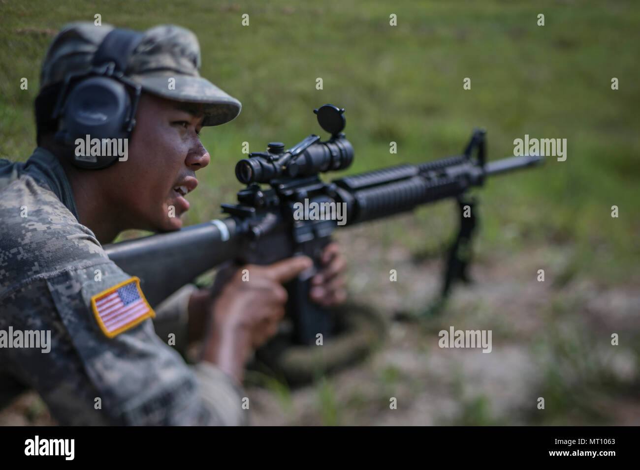 A U.S. Army Soldier fires an M16A4 rifle during the Squad Designated ...