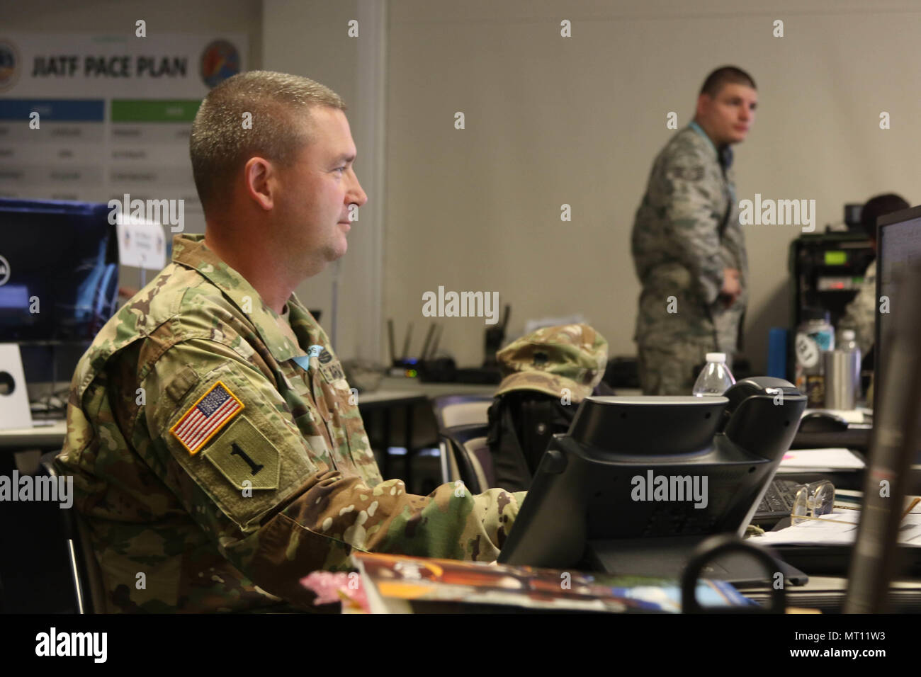 Lt. Col. Larry Boggs, plans and integrations officer for the West Virginia National Guard, monitors operations for the 2017 National Jamboree July 21, at the Glen Jean Armory in Glen Jean, W. Va.  The 2017 National Jamboree is being attended by 30,000 scouts, troop leaders, volunteers and professional staff members, as well as more than 15,000 visitors. Approximately 1,200 military members from the Department of Defense and the U.S. Coast Guard are providing logistical support for the event. (U.S. Army photo by Sgt. Ondirae H. Abdullah-Robinson/22nd Mobile Public Affairs Detachment) Stock Photo