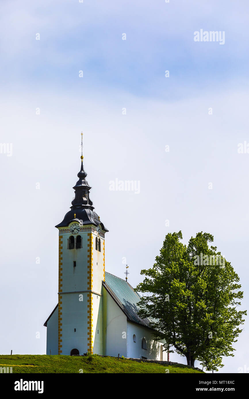 The local church of Planina nad Horjulom is dedicated to Saint Andrew. It was first mentioned in written sources in 1526 and the current structure was Stock Photo