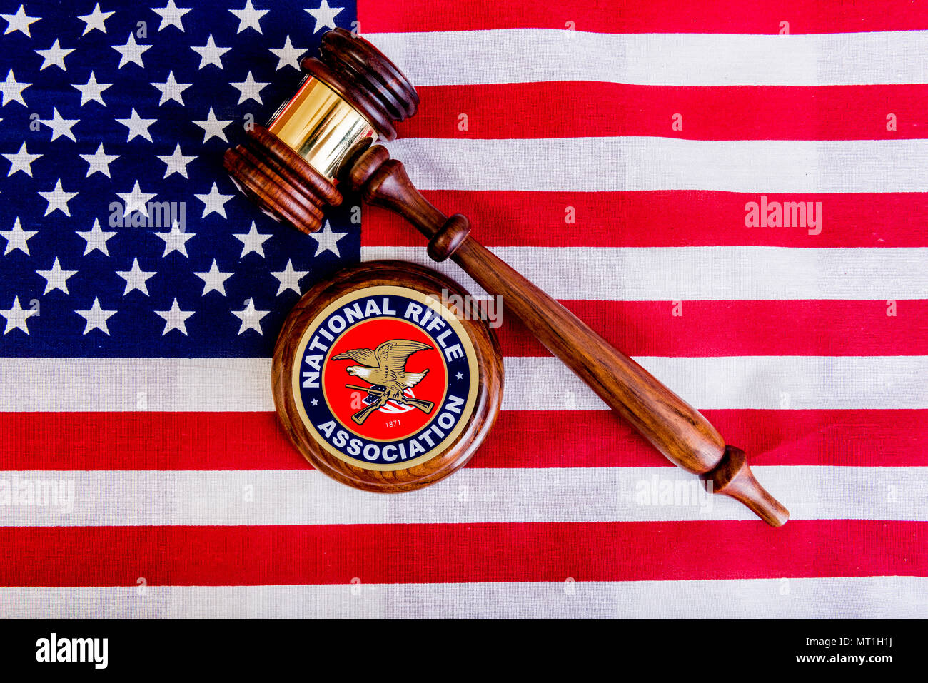 A NRA sticker with a judges gavel on an American flag Stock Photo