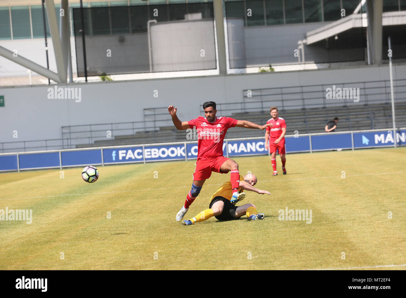 Manchester, UK. 28th May 2018. Celebrities in red shirts go head to head for 'We Love Manchester all-star football match'at Manchester City Academy to raise money for the charity that supports those affected by the Manchester Arena attack.  The emergency services team, which includes police officers, fire and ambulance crews will play against a Jet2holidays TV Allstars side represented by players from Coronation Street, Hollyoaks and Emmerdale in aid of the 'We Love Manchester Emergency Fund',,Manchester City Academy, Manchester, 27th May, 2018 (C)Barbara Cook/Alamy Live News Stock Photo