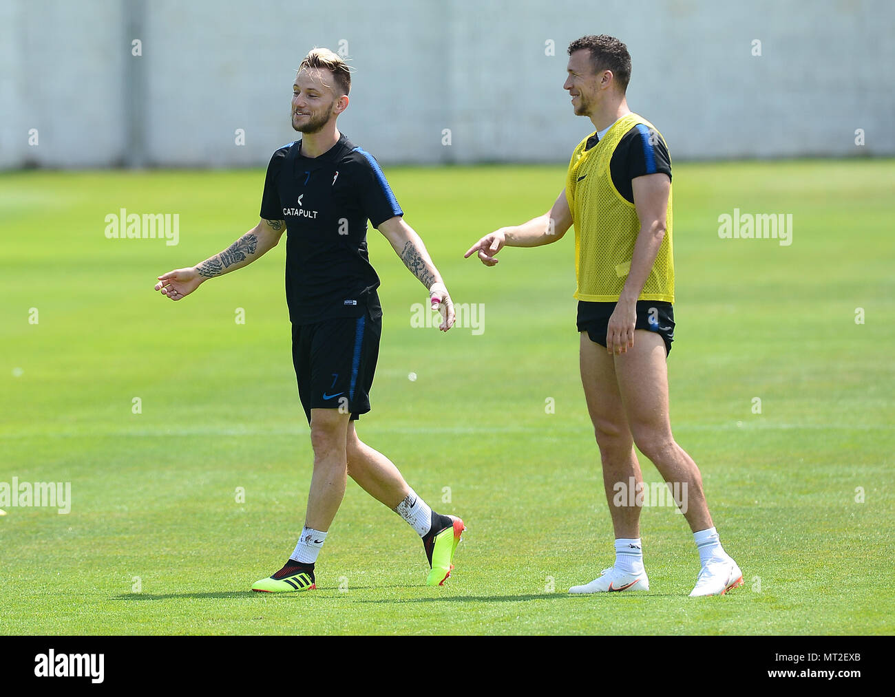 Rovinj, Croatia. 27th May, 2018. Ivan Rakitic (L) and Ivan Perisic of Croatian national team attend a training session for 2018 FIFA World Cup in Rovinj, Croatia, on May 27, 2018. Credit: Marko Prpic/Xinhua/Alamy Live News Stock Photo