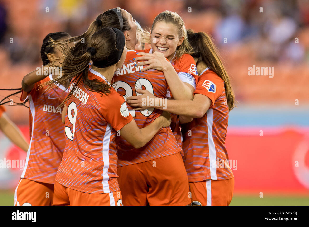 Houston, TX, USA. 27th May, 2018. Houston Dash forward Kealia Ohai (7) celebrates with teammates after scoring a goal during a NWSL soccer match between the Houston Dash and the Washington Spirit at BBVA Compass Stadium in Houston, TX. The Dash won 3 to 2.Trask Smith/CSM/Alamy Live News Stock Photo