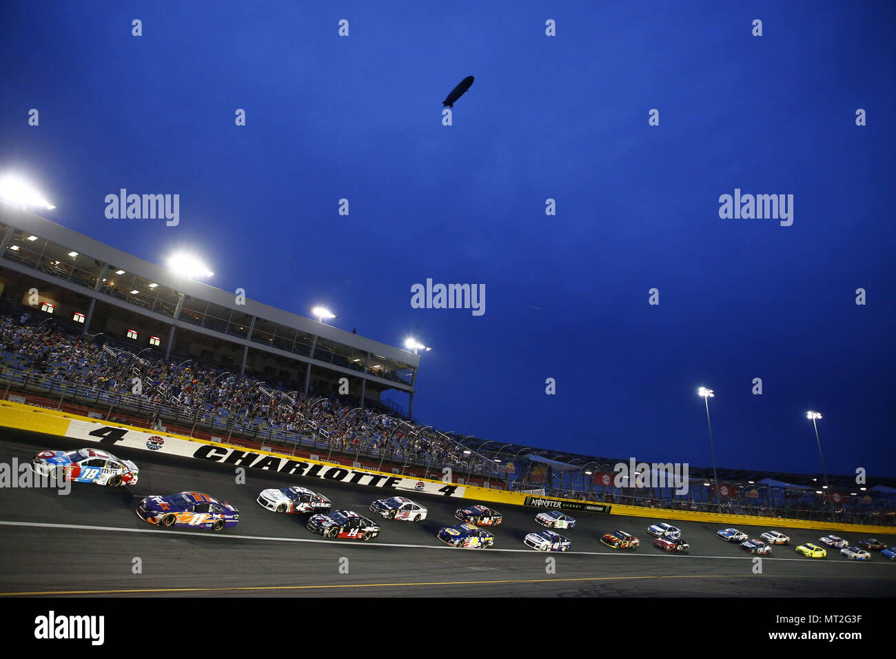 Concord, North Carolina, USA. 27th May, 2018. The Monster Energy NASCAR Cup Series teams race through turn four during the Coca-Cola 600 at Charlotte Motor Speedway in Concord, North Carolina. Credit: Chris Owens Asp Inc/ASP/ZUMA Wire/Alamy Live News Stock Photo
