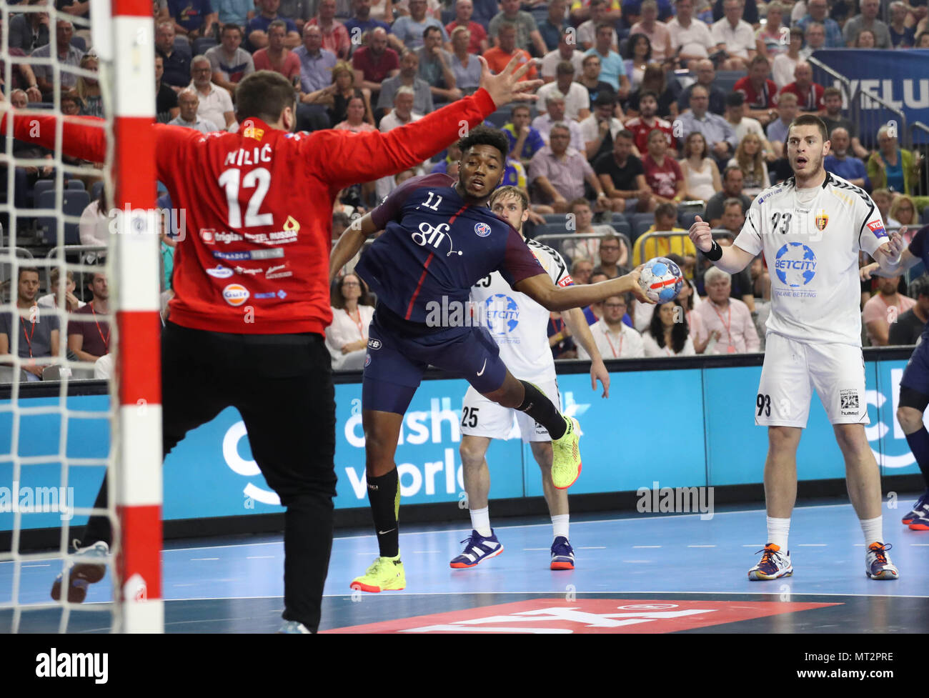 Benoit Kounkoud (Paris Saint Germain) and Strahinja Milic , Mijajlo Marsenic (Varda HC) during the EHF Champions
