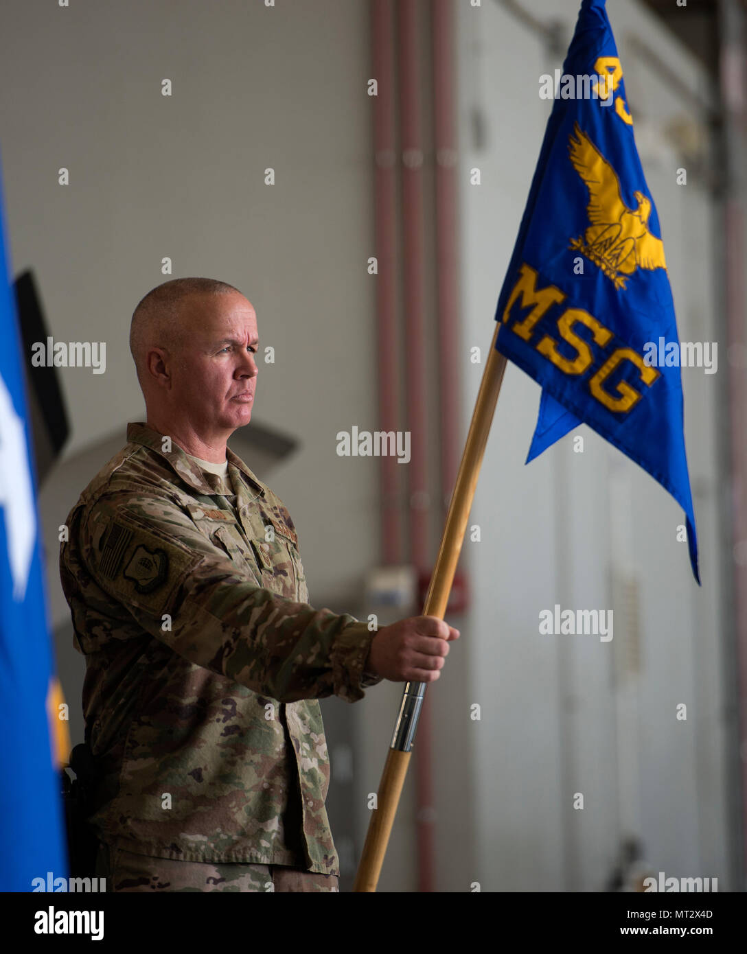 Chief Master Sgt. Michael Lemond, the 455th Expeditionary Mission Support Group superintendent, stands at parade rest during the 455th EMSG change of command ceremony at Bagram Airfield, Afghanistan, July 20, 2017. Lemond is deployed out of Barksdale Air Force Base, Louisiana, where he serves as the 2nd MSG superintendent. (U.S. Air Force photo by Staff Sgt. Benjamin Gonsier) Stock Photo