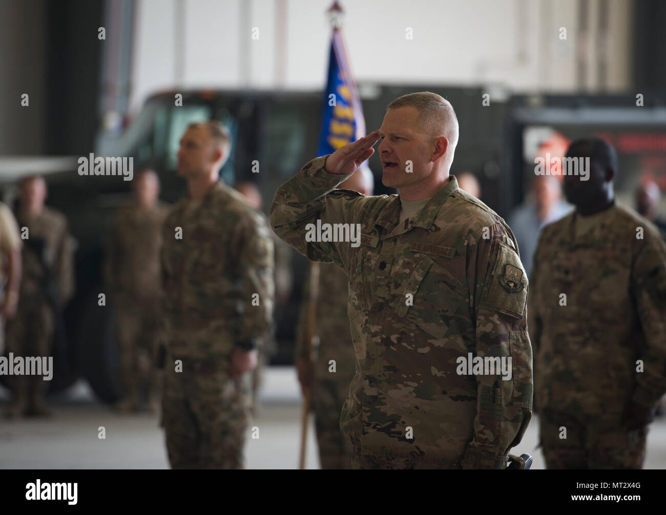 Lt. Col. Elton Sledge, the 455th Expeditionary Mission Support Group deputy commander, renders a salute during the 455th EMSG change of command ceremony at Bagram Airfield, Afghanistan, July 20, 2017. During the ceremony, Col. Bradford Coley relinquished command of the 455th EMSG to Col. Phillip Noltemeyer. (U.S. Air Force photo by Staff Sgt. Benjamin Gonsier) Stock Photo