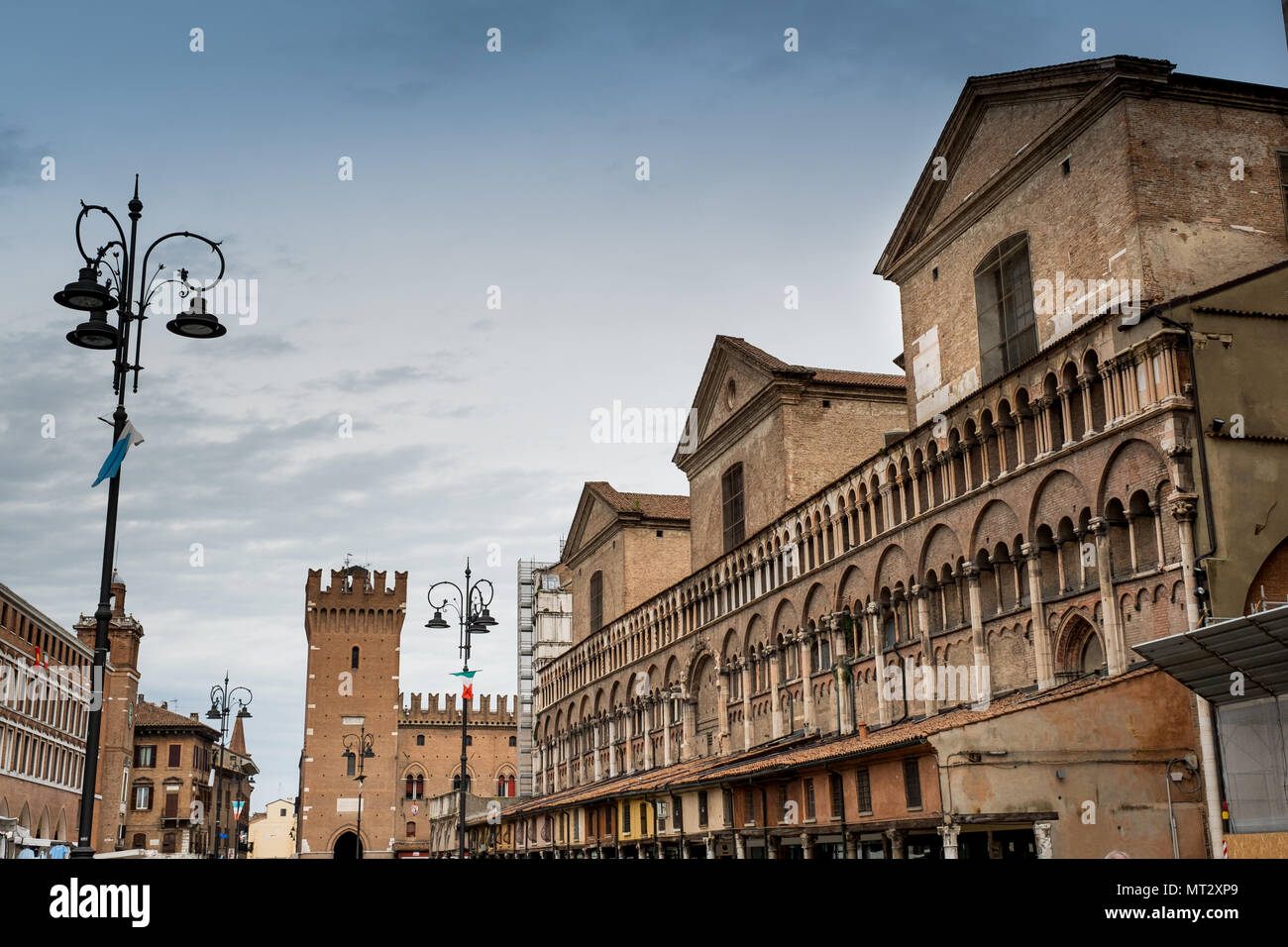 FERRARA, ITALY - Trieste and Trento square with Victoria tower and Cathedral of Saint George, Ferrara, Emilia-Romagna, Italy Stock Photo