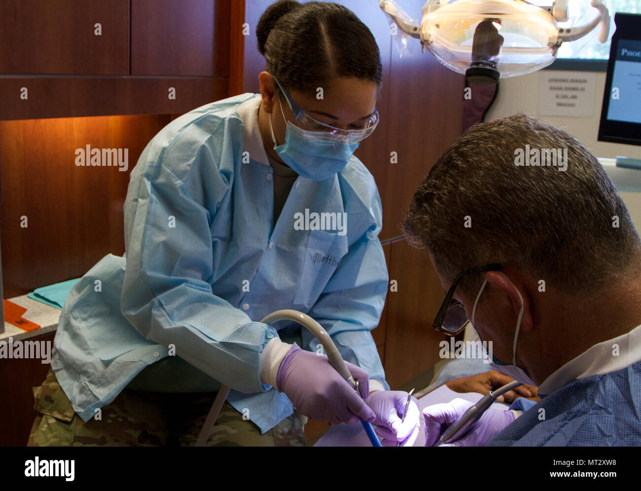 Spc. Cleopatra Matthews, a dental specialist with the 7239th Medical