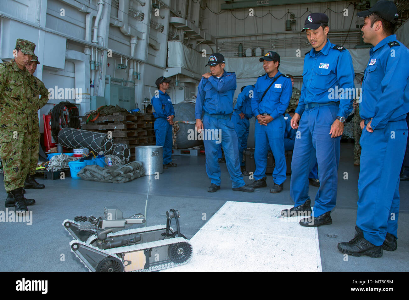 Members of the Japan Maritime Self-Defense Force (JMSDF) participate in improvised explosive device training aboard JDS Bungo (MST 464) during 2JA Mine Countermeasure Exercise (2JA MCMEX) in Japan’s Mutsu Bay July 20, 2017. 2JA MCMEX is an annual bilateral exercise between the U.S. Navy and JMSDF to strengthen interoperability and increase proficiencies in mine countermeasure operations. (U.S. Navy Combat Camera photo by Mass Communication Specialist 2nd Class Alfred A. Coffield) Stock Photo