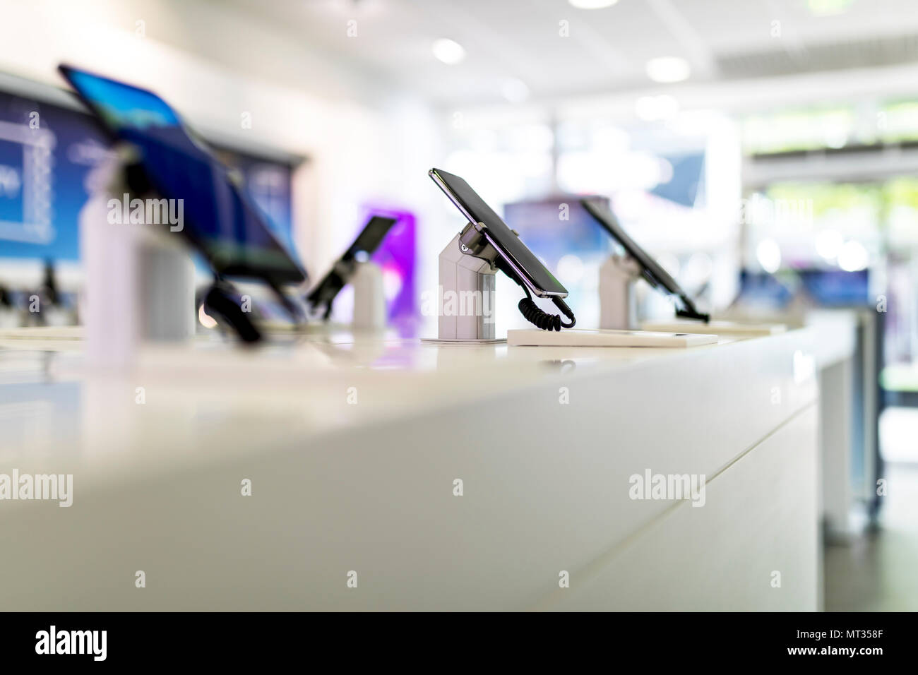 Close up of cell phones or mobile phones on display in a modern, clean