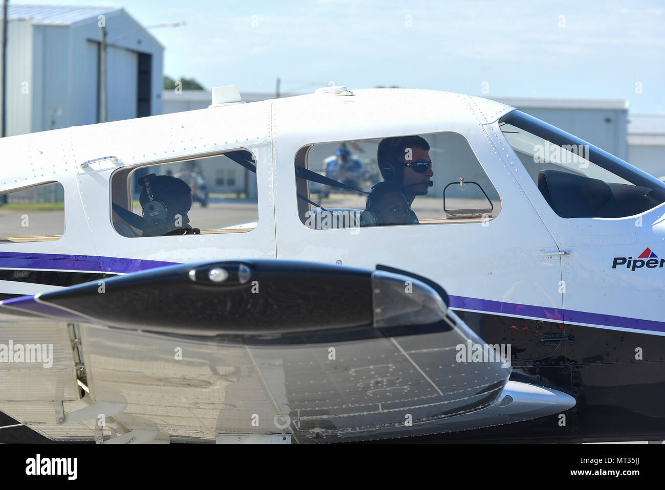 Local Valdosta youth await to takeoff in a Piper Archer aircraft during