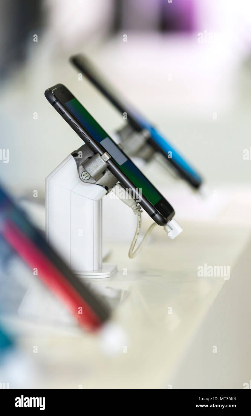 Close up of cell phones or mobile phones on display in a modern, clean