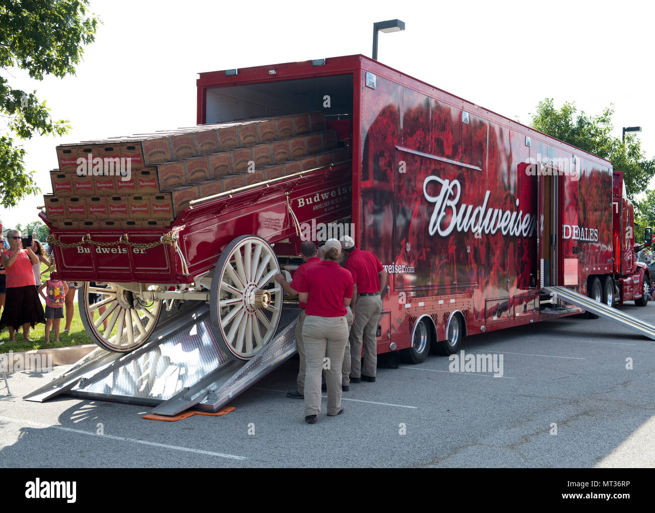 The Budweiser Clydesdales wagon is unloaded from a tractor trailer July
