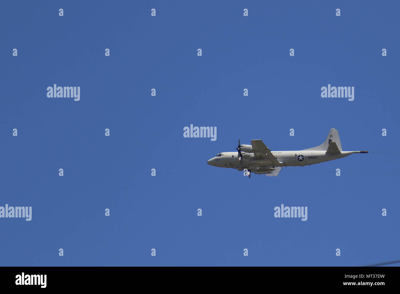 A U.S. Navy P-3 Orion aircraft from the Scientific Development Squadron ONE (VXS-1), Patuxent River Naval Air Station, Md., flies over the 2017 National Jamboree July 25, 2017 at the Summit Bechtel Reserve, W.Va.  The 2017 National Jamboree is being attended by 30,000 scouts, troop leaders, volunteers and professional staff members, as well as more than 15,000 visitors. Approximately 1,200 military members from the Department of Defense and the U.S. Coast Guard are providing logistical support for the event. (U.S. Army Photo by Sgt. Ondirae H. Abdullah-Robinson) Stock Photo