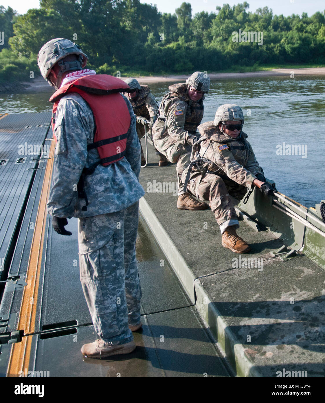 Active Army Soldiers from the 502nd Multi Role Bridge Co., pull on ...