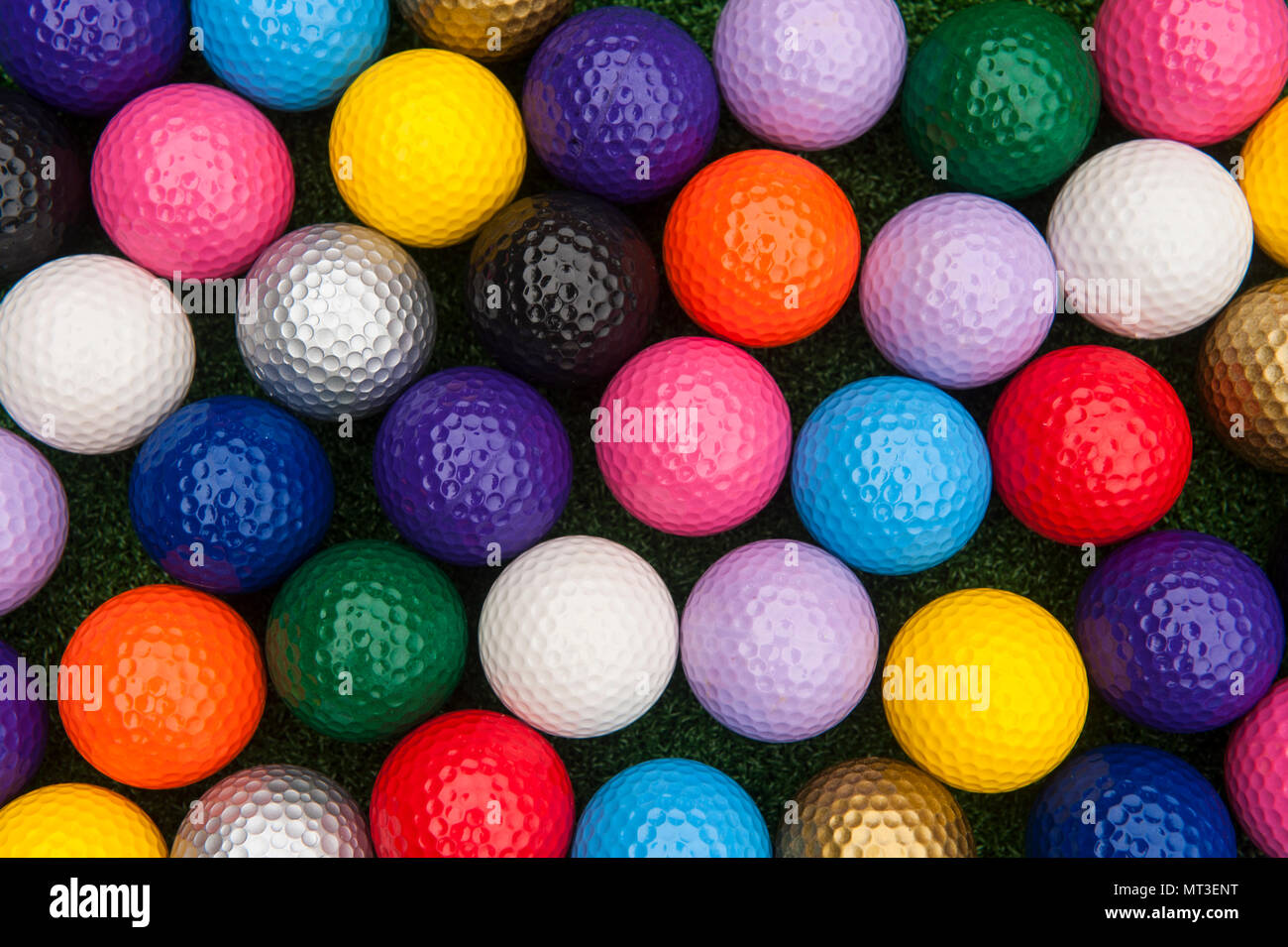 Variety of colorful balls for putt putt or mini golf Stock Photo