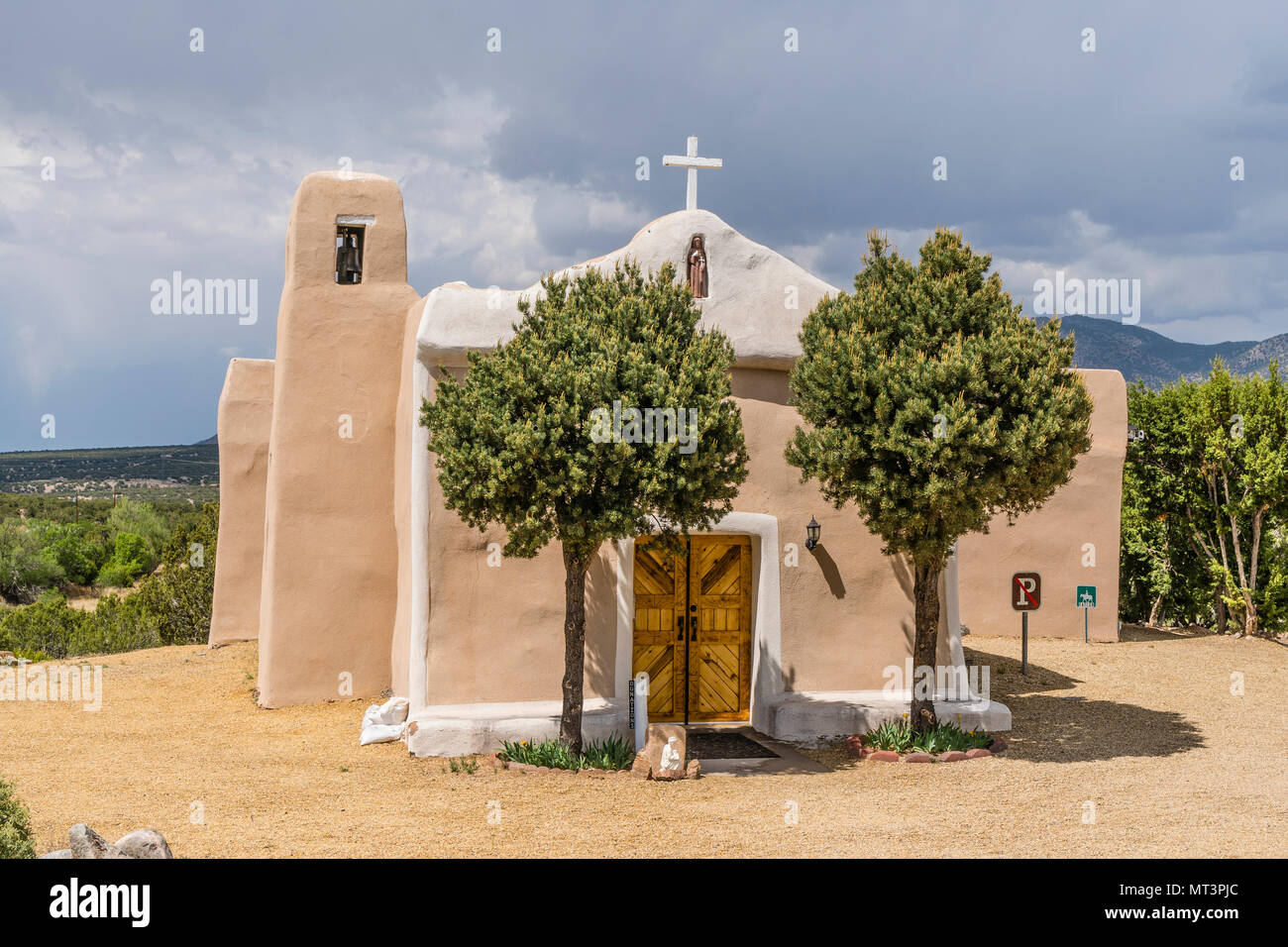 San Francisco de Asis Catholic Church in Golden, New Mexico. It was established in 1839. The church celebrates Fiesta de San Francisco de Assis. Stock Photo