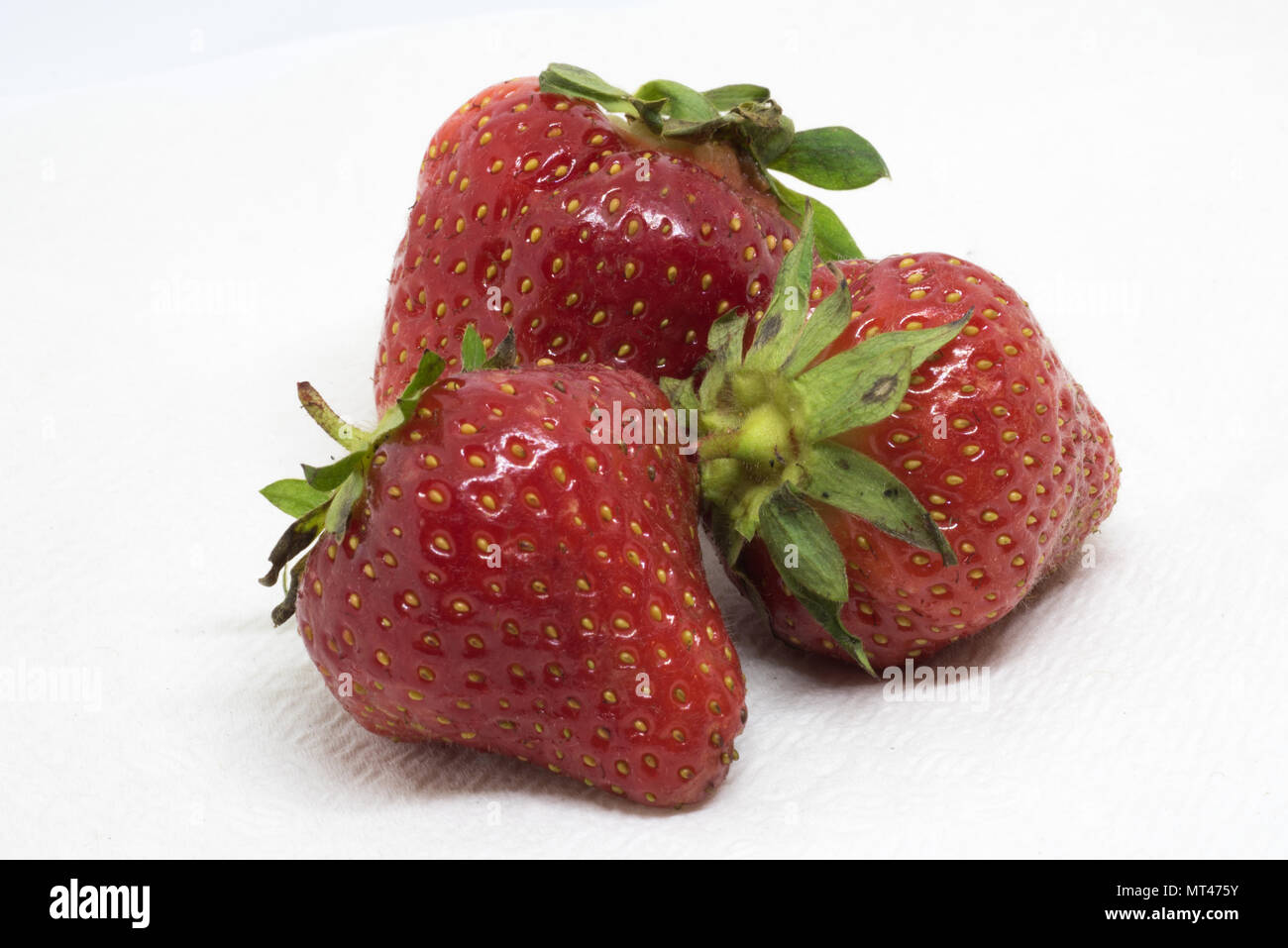 Three Ripe Strawberries Stock Photo - Alamy