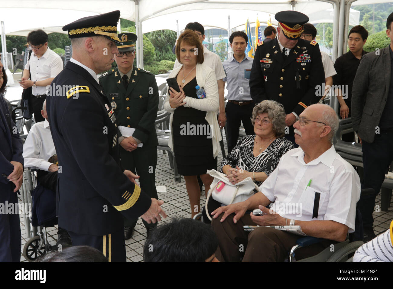Lt gen thomas s vandal eighth army commanding general talks to one