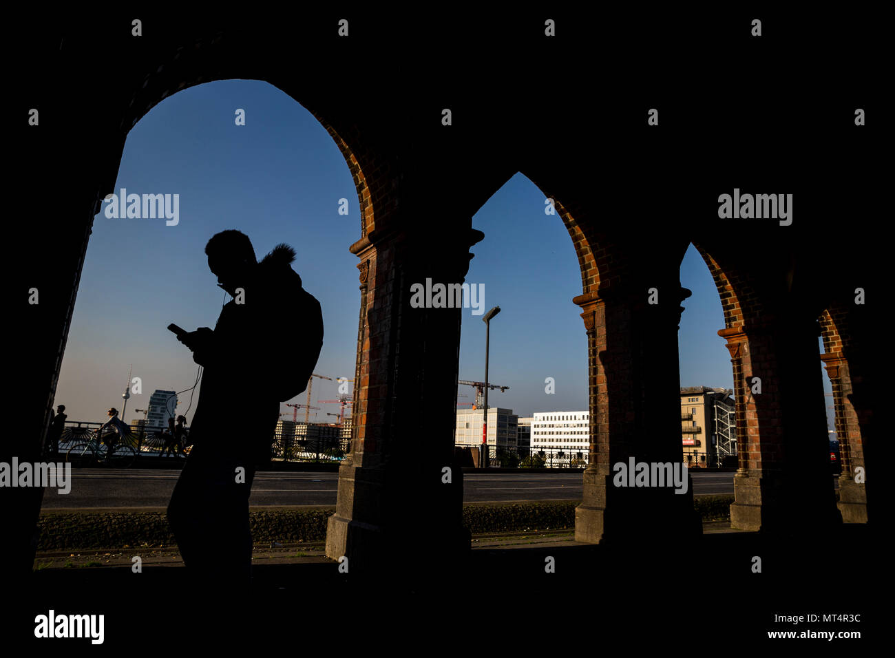 A Checks His Mobile Phone Stock Photos A Checks His Mobile Phone