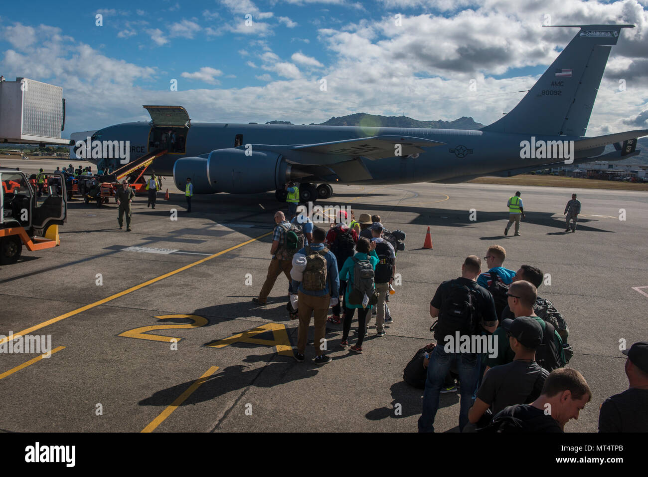 Pacific Angel (PACANGEL) 17-3 main body personnel board a 92nd Air Refueling Wing KC-135 Stratotanker from Fairchild Air Force Base, Wash., for their return flight home at the Nadi International Airport in Fiji, July 25, 2017. The active duty KC-135, flown by a crew completely comprised of Washington Air National Guard Citizen Airmen, provided the primary means of air transportation for PACANGEL 17-3 mission personnel, cargo and supplies. The KC-135 and its crew ensured the operation could execute by sustained rapid global mobility and continuous regional development through mobility partnersh Stock Photo