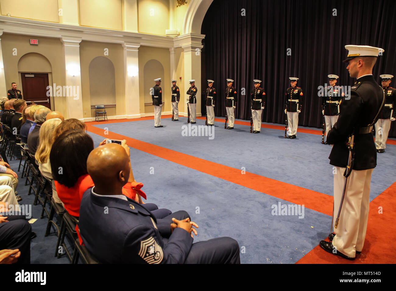 Marines of the U.S. Marine Corps Silent Drill Platoon execute precision rifle drill movements